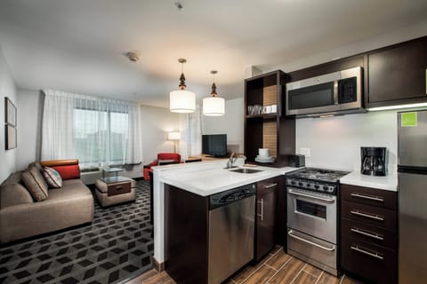 Suite, 2 Bedrooms | In-room safe, desk, laptop workspace, iron/ironing board
