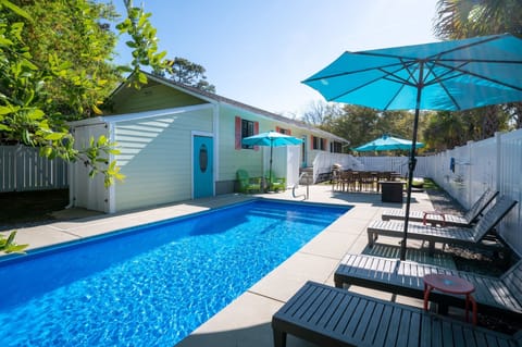 Private pool deck with plenty of seating