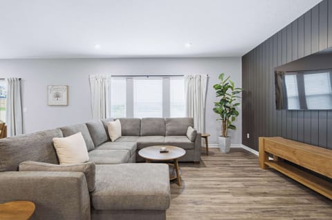 Curl up in the chic living room & stream your favorites on the smart TV​