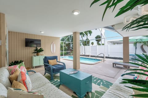 Enjoy the screened in pool area.