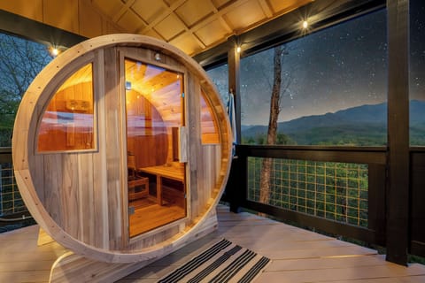 Relax and unwind in this sauna with a stunning view of the Smokies!