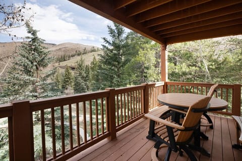 Private covered deck with BBQ and outdoor table