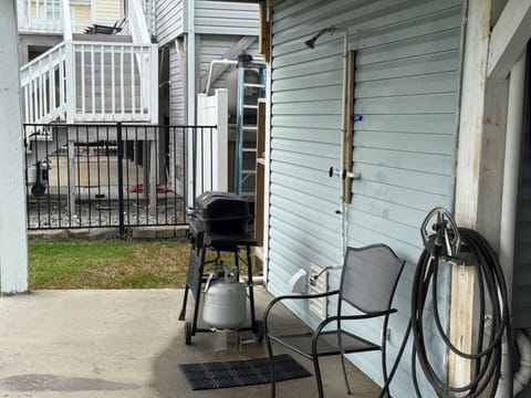 outdoor shower and gas grill