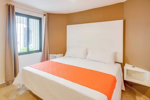 King bed, hair dryer, iron and security box in the bedroom