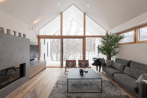 Chalet, Balcony, River View | Living area | Flat-screen TV, fireplace