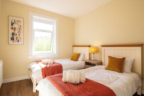 Designed with your comfort in mind, this bedroom provides a peaceful retreat with soft textures and elegant finishes.
