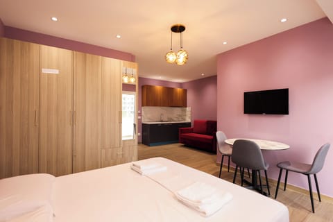 Deluxe Double Room, City View | Desk, laptop workspace, WiFi (free), bed sheets