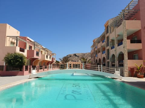 Outdoor pool, pool umbrellas, sun loungers