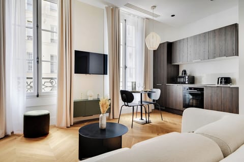 Studio | Living area | 32-inch flat-screen TV with cable channels