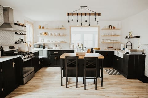 We transformed the kitchen to a modern day open concept, farmhouse kitchen. We have everything you need to cook your farm market finds at home. We love to gather here.


