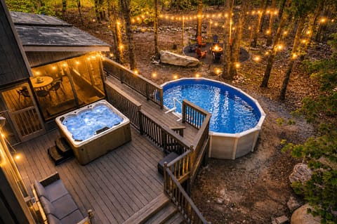 Private heated pool, hot tub, and outdoor lounge for group stays