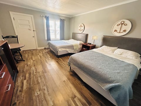 Room, 2 Queen Beds | Desk, iron/ironing board (on request), WiFi (free), bed sheets