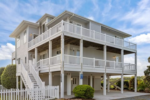 Welcome to Soundside Solace, an elevated coastal retreat with peaceful surroundings and room for the whole group