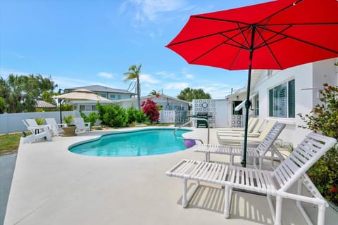 Relaxing Solar Heated Pool with Plenty of Chairs