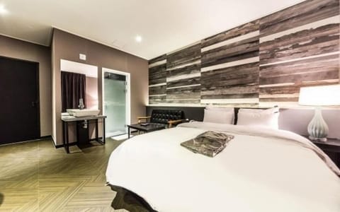 Deluxe Double Room, Non Smoking, City View | Desk, laptop workspace, blackout drapes, free WiFi