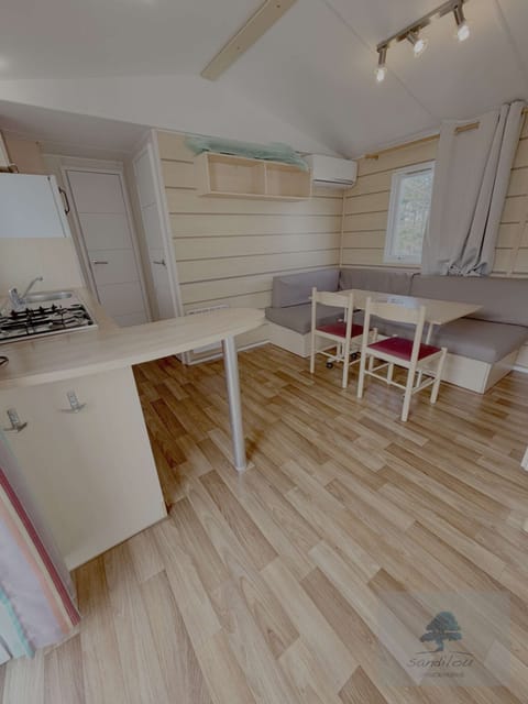 Living room equipped with modern air conditioning for optimal comfort in all seasons.