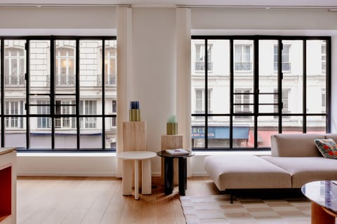 Family Apartment, City View | Living area | 60-inch Smart TV with satellite channels, Netflix, books