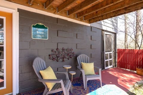 Lower level front porch near parking 
