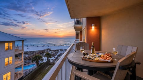 Private balcony with breathtaking Gulf views and beach access below.
