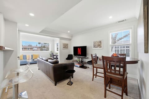 Experience a bright and seamless open-concept living space. Whether you are enjoying a meal at the table or relaxing in the sunlit lounge, this inviting retreat offers the perfect blend of comfort and modern style.