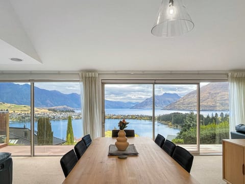 Panoramic views of the mountains and lake from your dining table