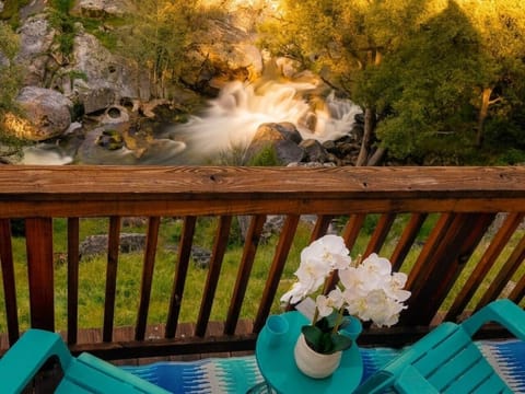 Relax on the deck with river views — grab a glass of wine and let the rushing water set the mood