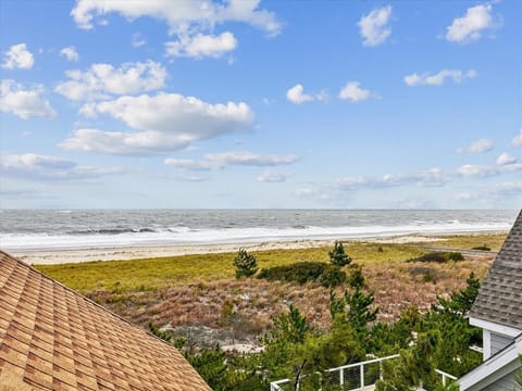 Oceanfront view — the beach just steps away.