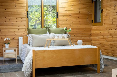 Spacious and cozy bedroom with a plush double bed, designed for restful nights and easy, relaxing mornings.