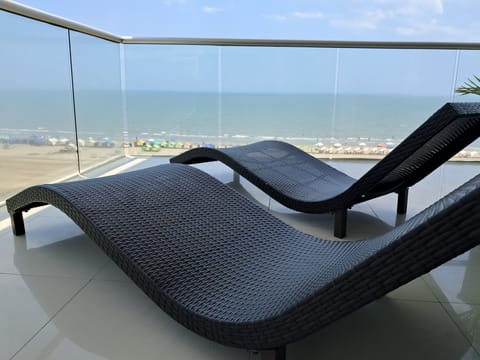 Deluxe Apartment, Balcony, Beach View | Property grounds