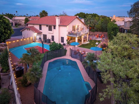 Above It All – See the beauty of the home from a bird’s-eye view, capturing the full expanse of its architecture and outdoor spaces.