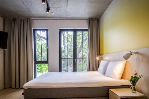 Family Room, Kitchen, City View | Iron/ironing board, free WiFi, wheelchair access