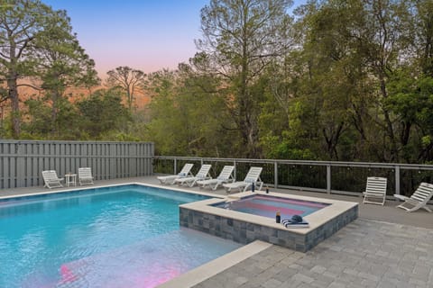 Pool area with surrounding trees.