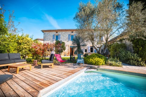 Terrace and garden furniture around the pool