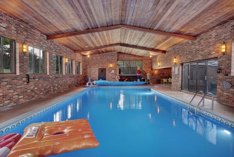 A rare fully enclosed heated indoor pool designed for year-round enjoyment.