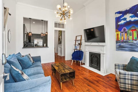 Stylish living room with cozy seating, high ceilings, and a bright, welcoming feel—perfect for gathering together.