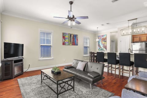 Bright and inviting living room with cozy couches—perfect for movie nights or unwinding together.
