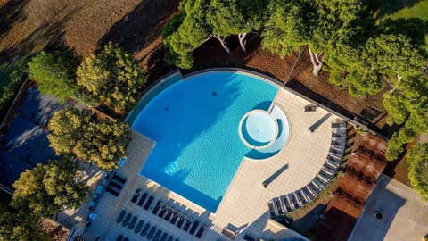 Lounge by the pool in the sunshine.Take a dip in the outdoor pool.