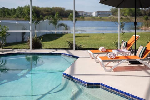 Sun-drenched pool area with comfortable loungers for ultimate chill time.