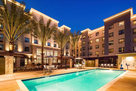 Inviting outdoor pool area lit up at night.