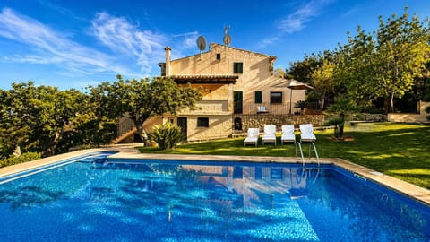 Exterior of the finca with private pool, garden and relaxation area in Pollensa