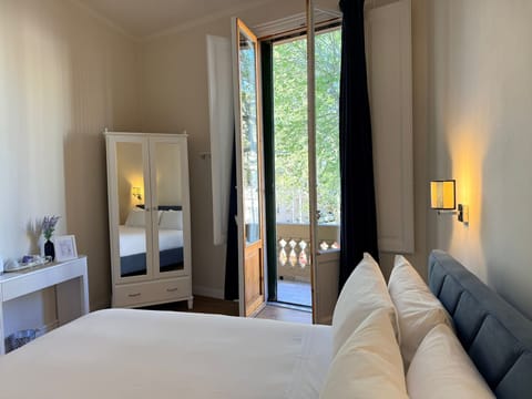 Deluxe Double Room, Balcony | In-room safe, desk, iron/ironing board, free WiFi