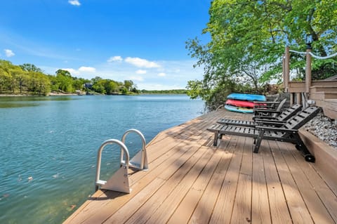 Lake ready with a private dock, kayaks, SUP, loungers, boat cleats, & lily pad!