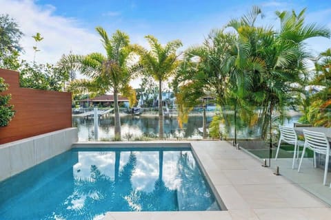 Your Lap Pool, overlooking the waterfront, tropical gardens and your own private beach.