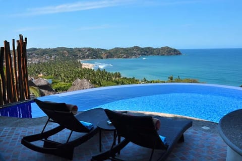 Pool area with view to Punta Sayulita and main surf break. 