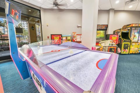 Game room with arcade and air hockey