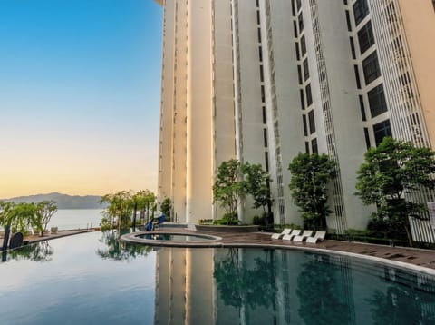 Outdoor pool, open 7:00 AM to 10:00 PM, sun loungers