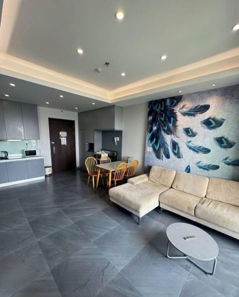 Business Apartment, City View | Living area | Flat-screen TV