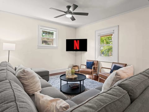 Living Room: Enjoy a warm and welcoming living area filled with natural light, comfortable couches, and modern touches that create the perfect setting for relaxing evenings indoors.