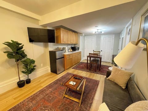 Dining space and Kitchen area. Wall mounted TV 