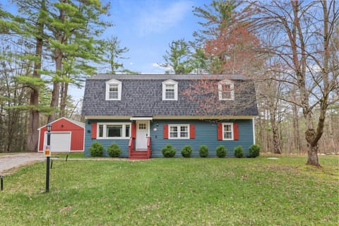 Charming countryside home surrounded by trees, offering a peaceful and private getaway.